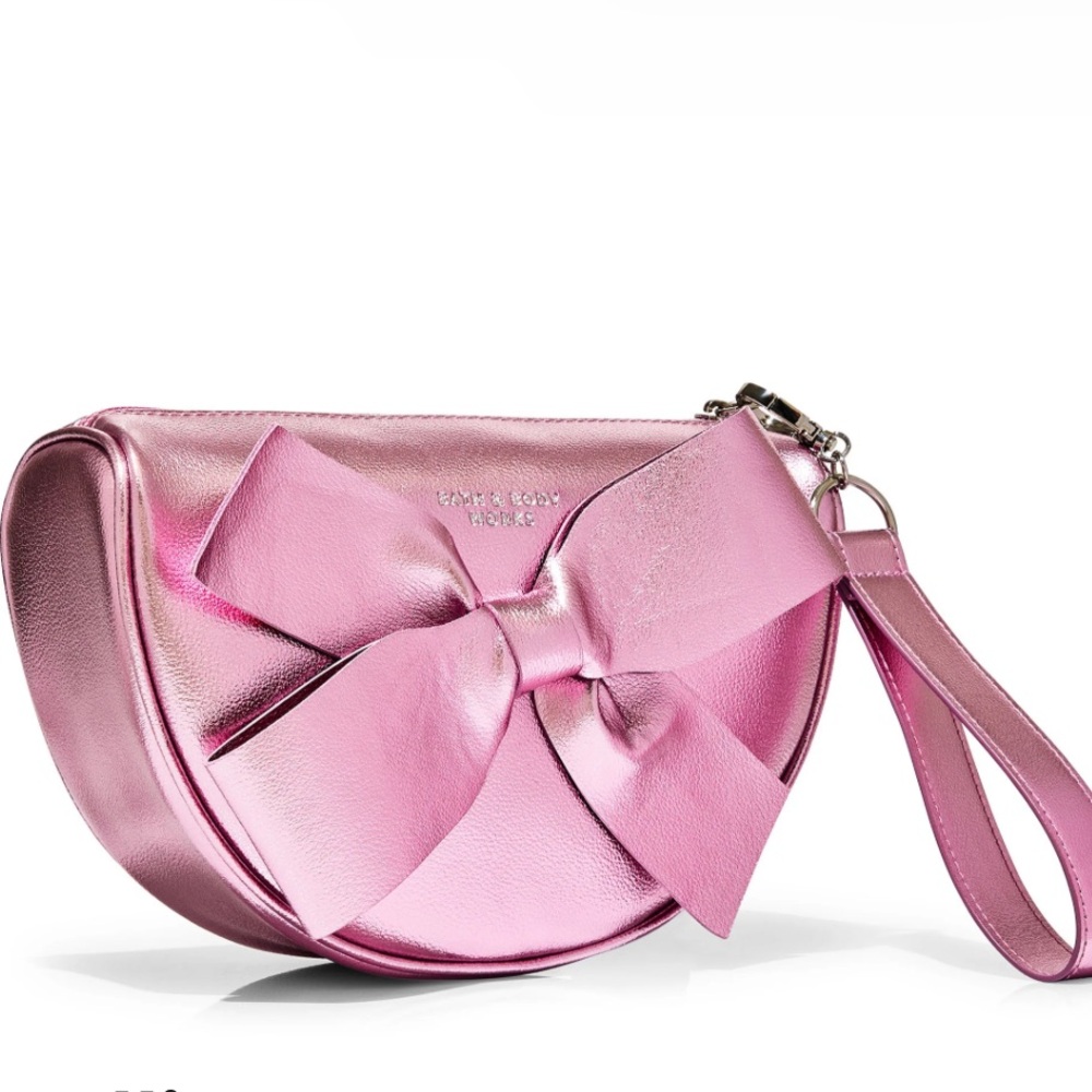 NWT Bath and Body Works Metallic Bow
Cosmetic Bag $15